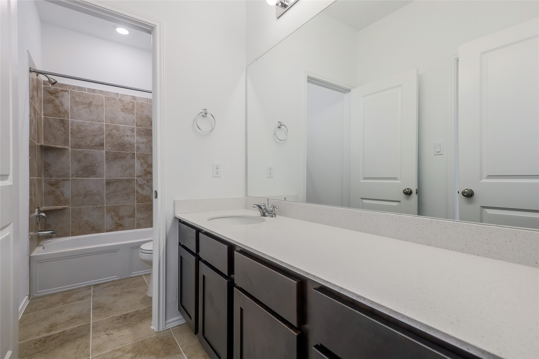 818 Affazia Lane Georgetown, TX 78628 - Photo 21 of 27 a bathroom with a sink and a mirror