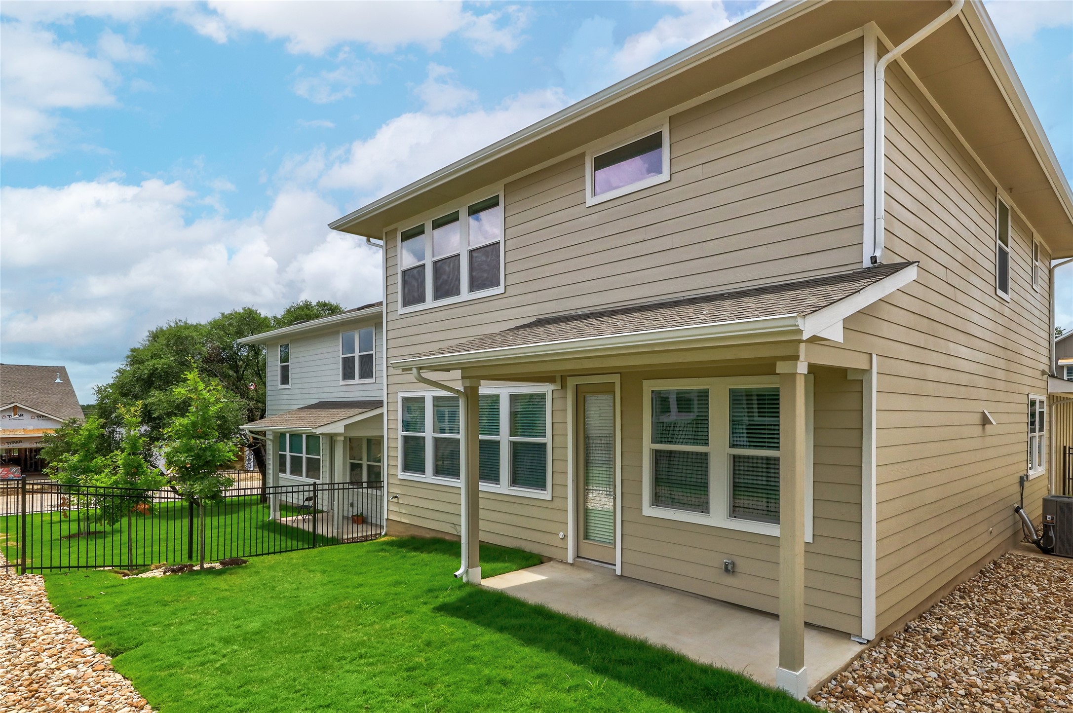 818 Affazia Lane Georgetown, TX 78628 - Photo 25 of 27 a view of an house with backyard space and garden