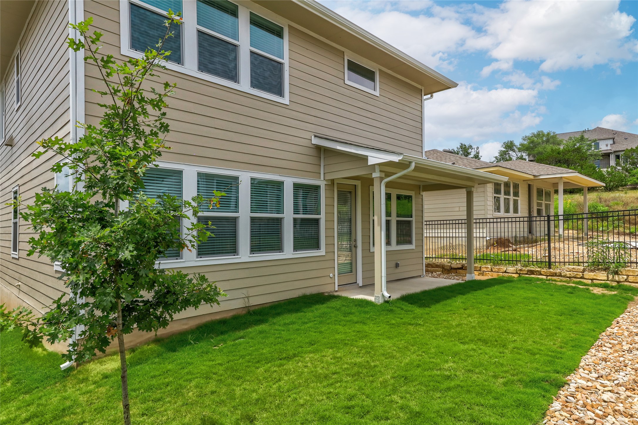818 Affazia Lane Georgetown, TX 78628 - Photo 26 of 27 a view of a house with a yard