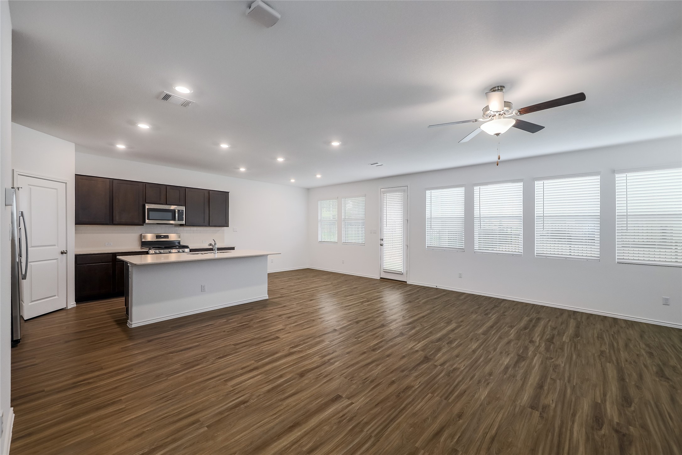 818 Affazia Lane Georgetown, TX 78628 - Photo 4 of 27 a view of kitchen with sink microwave and stove
