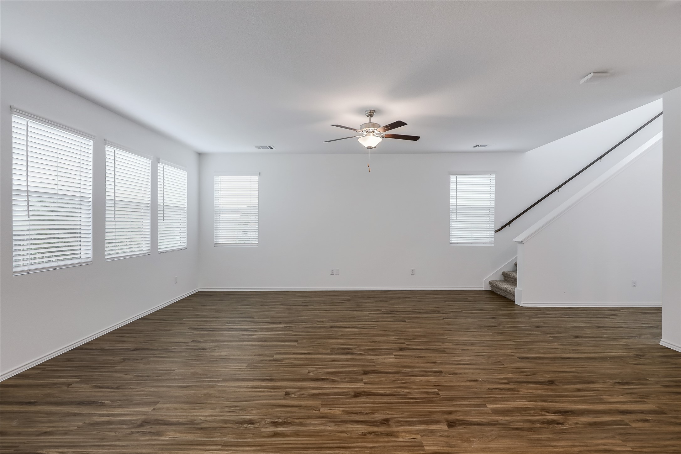 818 Affazia Lane Georgetown, TX 78628 - Photo 6 of 27 a view of an empty room with windows