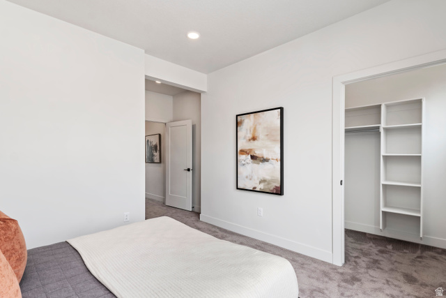 32 West 400 South Bountiful, UT 84010 - Photo 20 of 31 Carpeted bedroom with a walk in closet and baseboards. Model Home