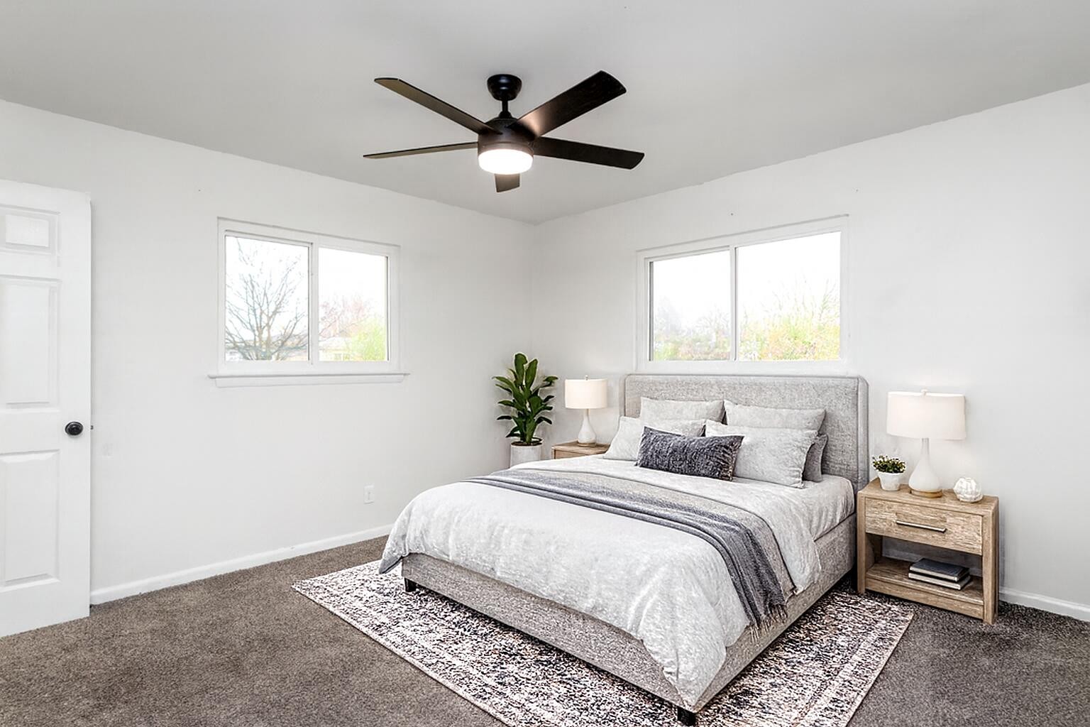 151 Sharon Circle Rossville, GA 30741 - Photo 5 of 21 a bedroom with a large bed and a chandelier