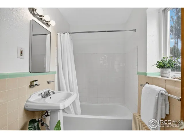 a bathroom with a sink and a bathtub
