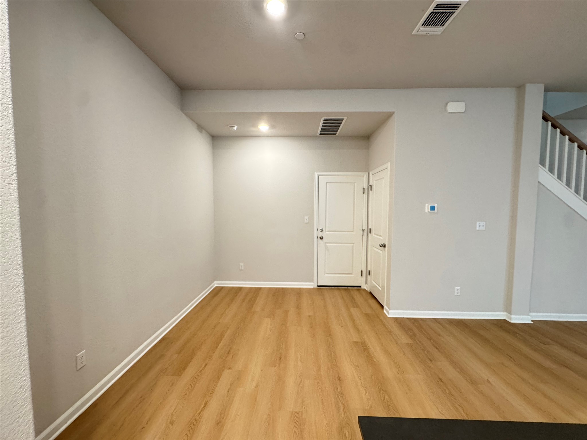 3000 Chisholm Trail Road, Unit 3 Round Rock, TX 78681 - Photo 8 of 28 a view of a big room with wooden floor and windows