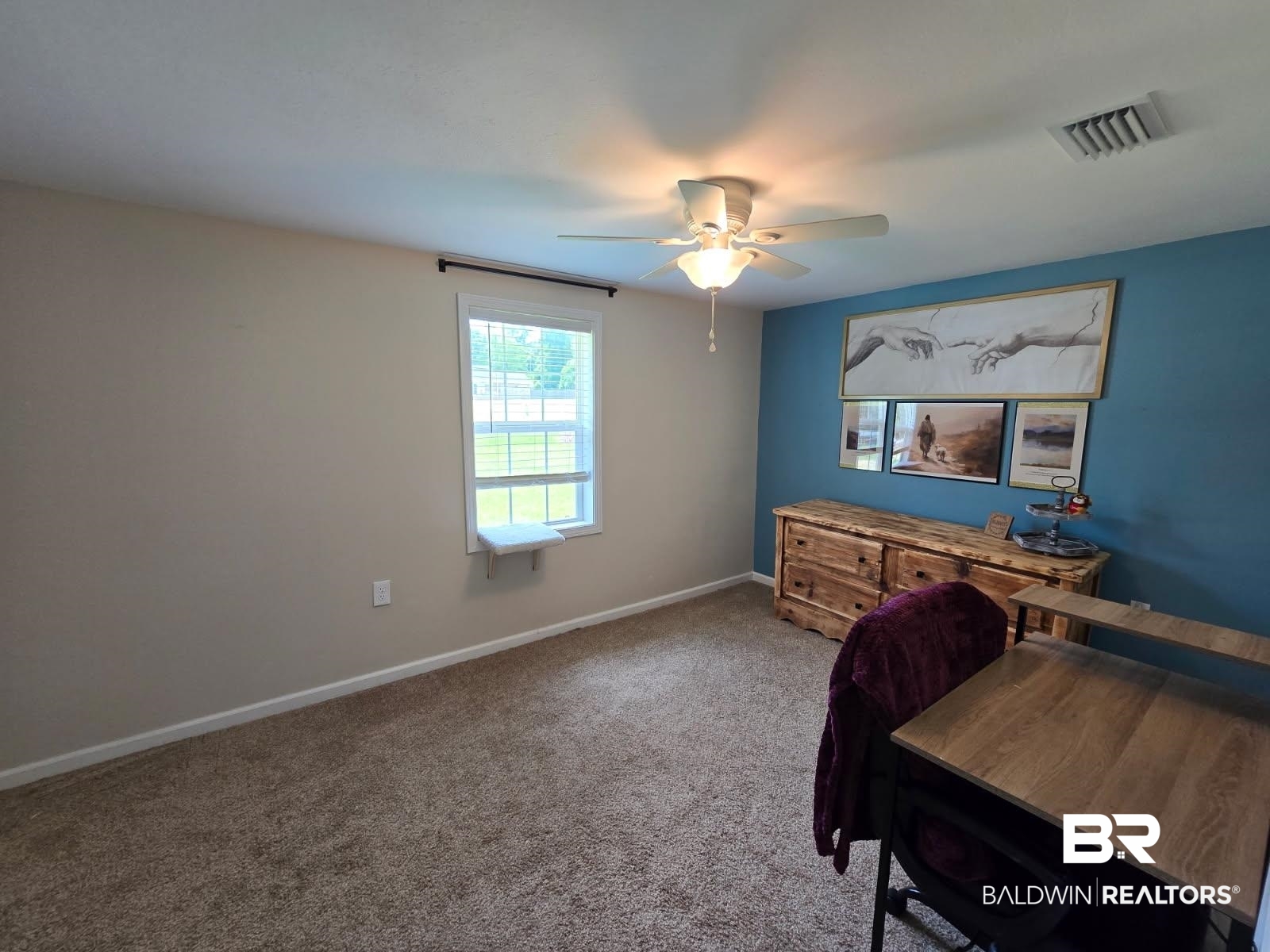 2534 Foshee Road Brewton, AL 36426 - Photo 8 of 16 Carpeted bedroom with baseboards, a ceiling fan, and visible vents