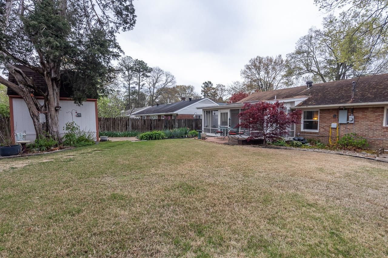 5130 Mason Road Memphis, TN 38117 - Photo 26 of 26 front view of a house with a yard