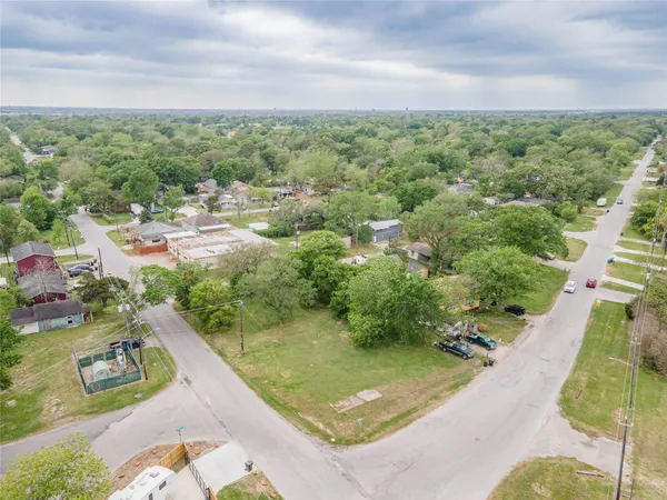 an aerial view of a house with outdoor space