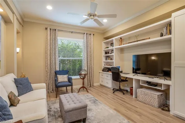 a spacious bathroom with a bathtub sink and mirror