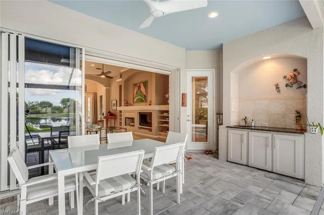 a view of a patio with a table chairs and balcony