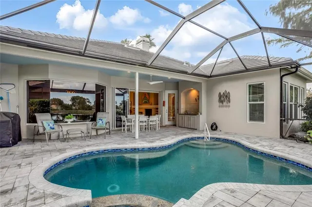 a view of swimming pool from a window