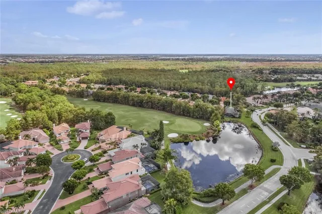 a view of a garden with a building in the background