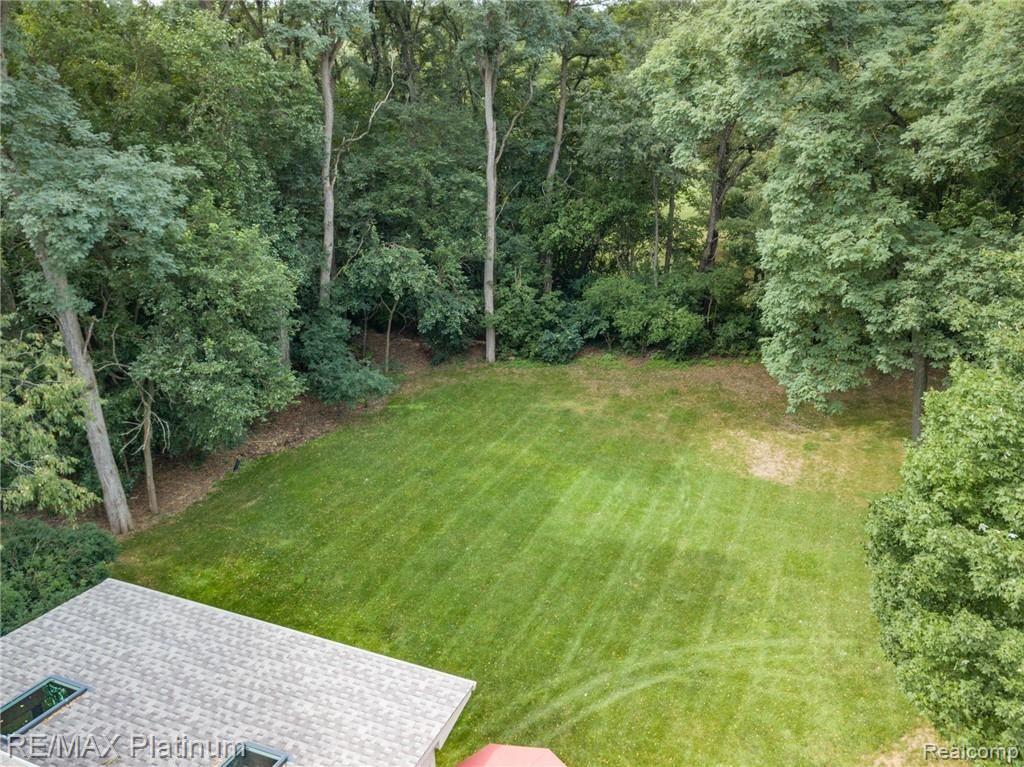 7215 Summit Ridge Brighton, MI 48116 - Photo 20 of 42 Backyard Property View
