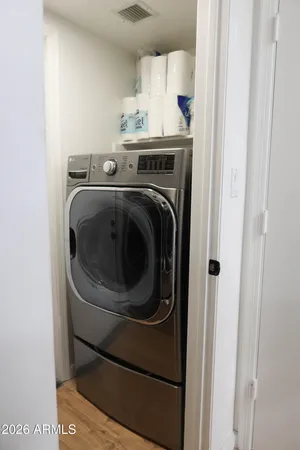 a utility room with dryer and washer
