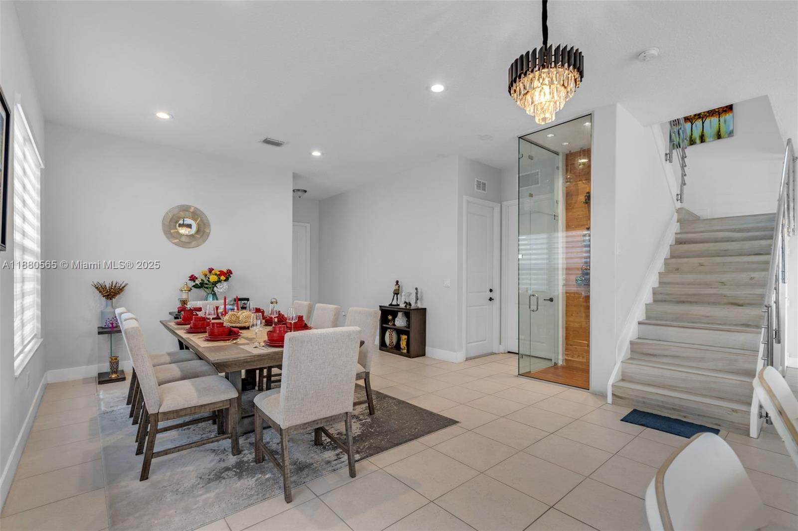 3332 West 95th Terrace, Unit 3332 Hialeah, FL 33018 - Photo 5 of 31 a view of a dining room with furniture