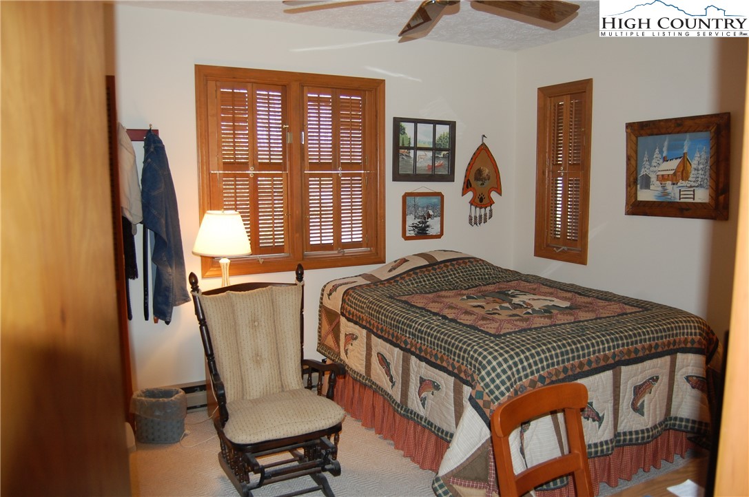 14 Briar Road Newland, NC 28657 - Photo 14 of 37 a bedroom with a bed and a window