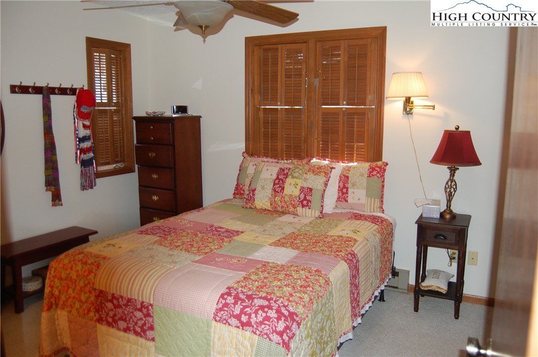 14 Briar Road Newland, NC 28657 - Photo 16 of 37 a bedroom with a bed and a dresser