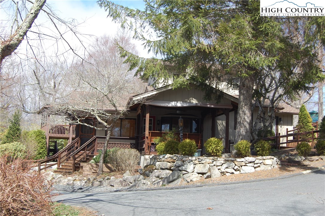 14 Briar Road Newland, NC 28657 - Photo 19 of 37 a view of a house with a yard and tree s