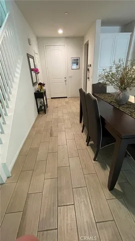 a view of a livingroom with furniture and a rug