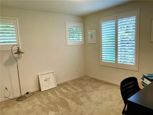 a bathroom with a sink double vanity and a granite