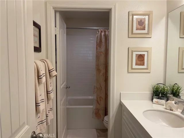 a kitchen with a sink and a stove