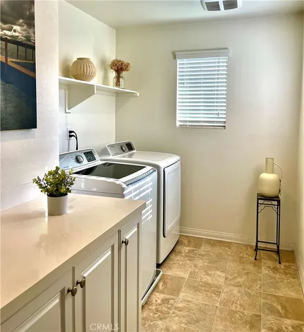 a view of a refrigerator in a kitchen