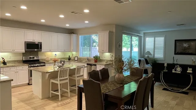 a view of a dining room with furniture