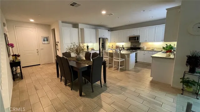 a view of a dining room with furniture