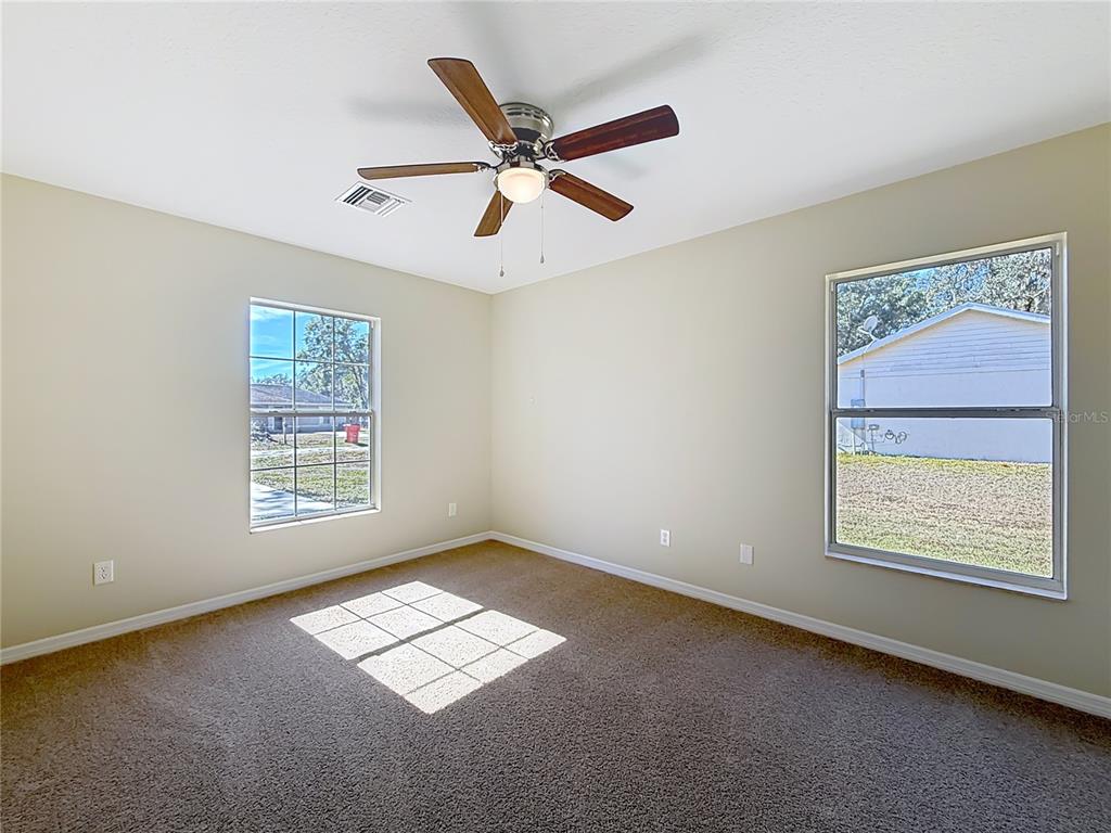 1314 Southwest 68th Avenue Bushnell, FL 33513 - Photo 26 of 33 a view of an empty room with a window