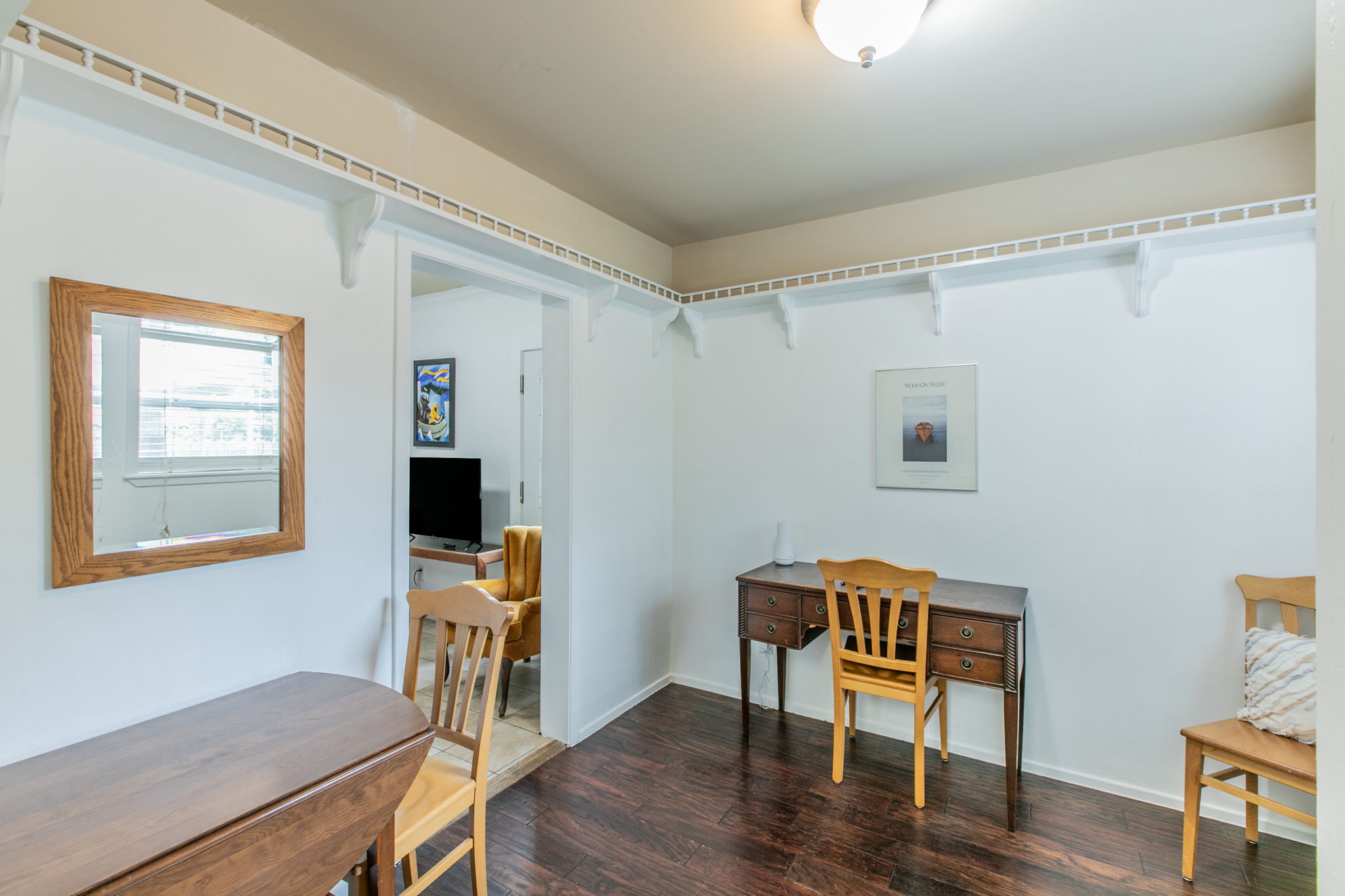 1107 Vargas Road Austin, TX 78741 - Photo 6 of 17 Rich hardwood floors create a welcoming atmosphere in this versatile den or office space.