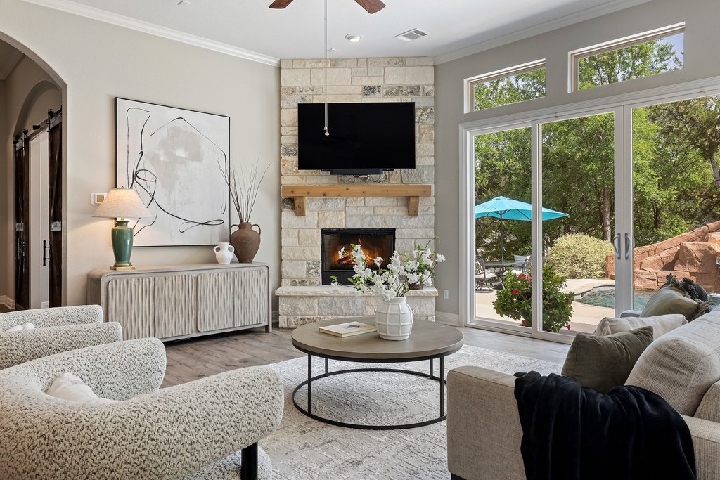 108 Berry Cove Georgetown, TX 78628 - Photo 8 of 39 a living room with furniture and a fireplace