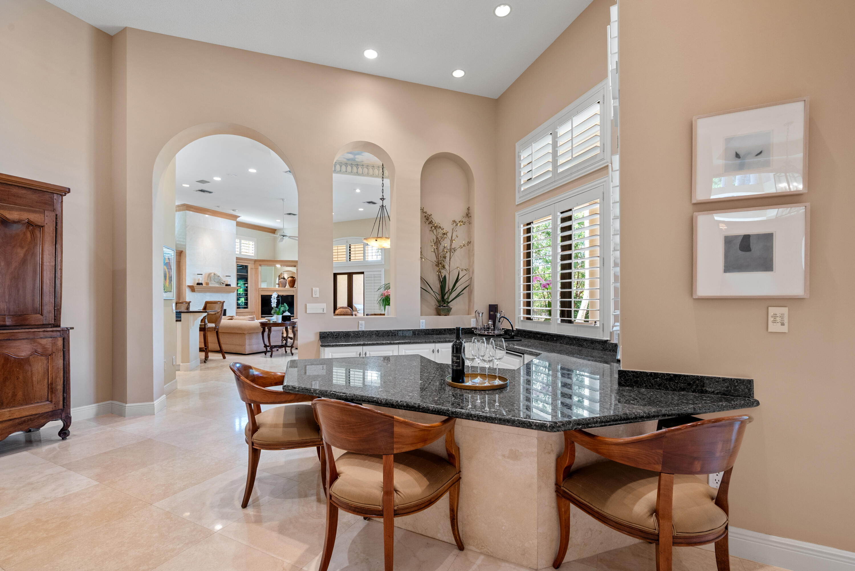 18800 Long Lake Drive Boca Raton, FL 33496 - Photo 13 of 60 a dining hall with stainless steel appliances granite countertop a dining table and chairs
