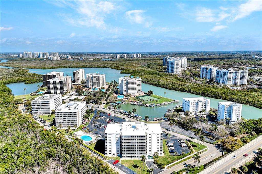 1 Bluebill Avenue, Unit 409 Naples, FL 34108 - Photo 21 of 25 a view of lake with city view