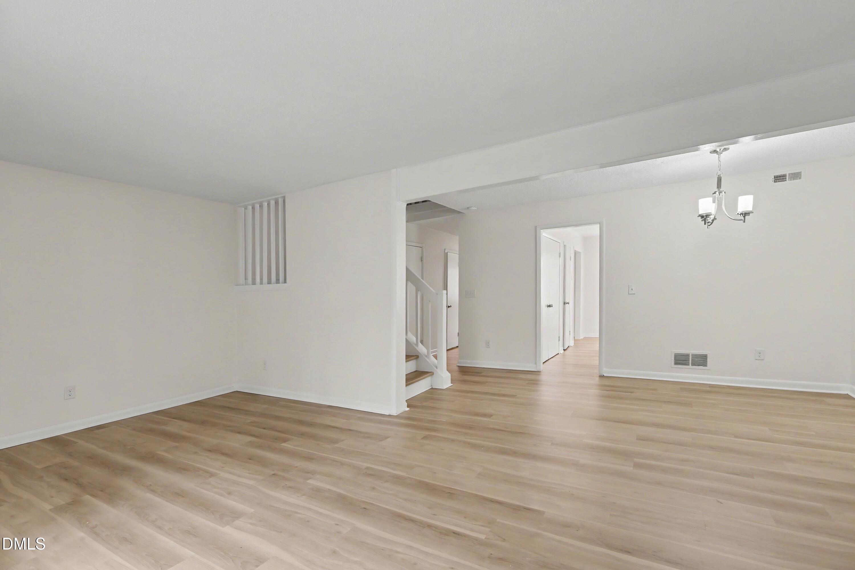 1304 Seaton Road, Unit 30 Durham, NC 27713 - Photo 14 of 25 wooden floor in an empty room