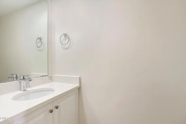 a view of a backyard of the house