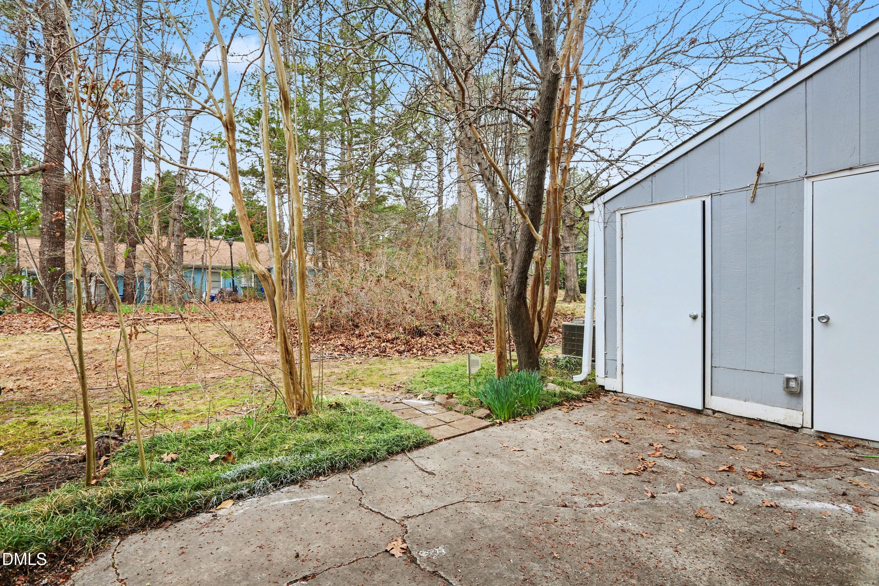 1304 Seaton Road, Unit 30 Durham, NC 27713 - Photo 24 of 25 a view of a backyard of the house