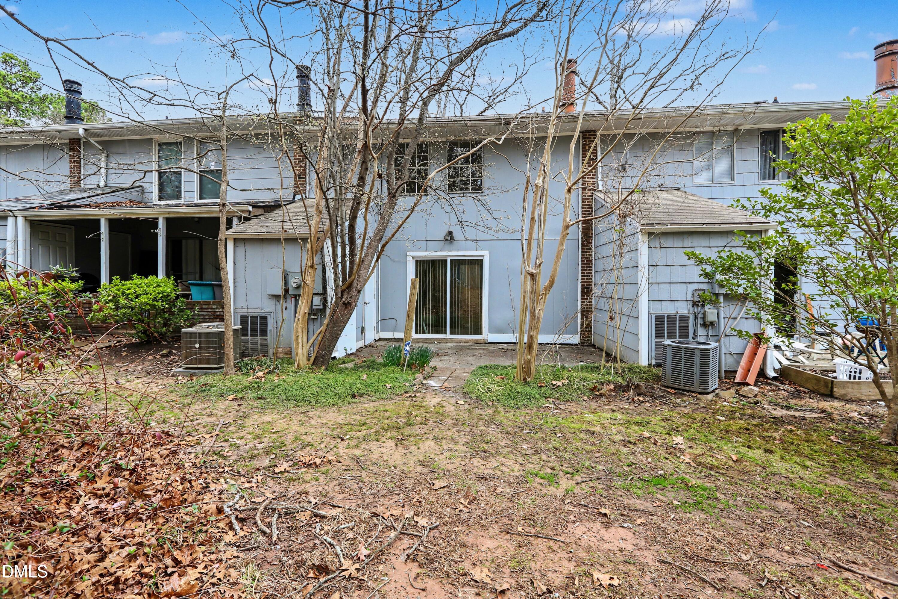 1304 Seaton Road, Unit 30 Durham, NC 27713 - Photo 25 of 25 a view of a house with a yard