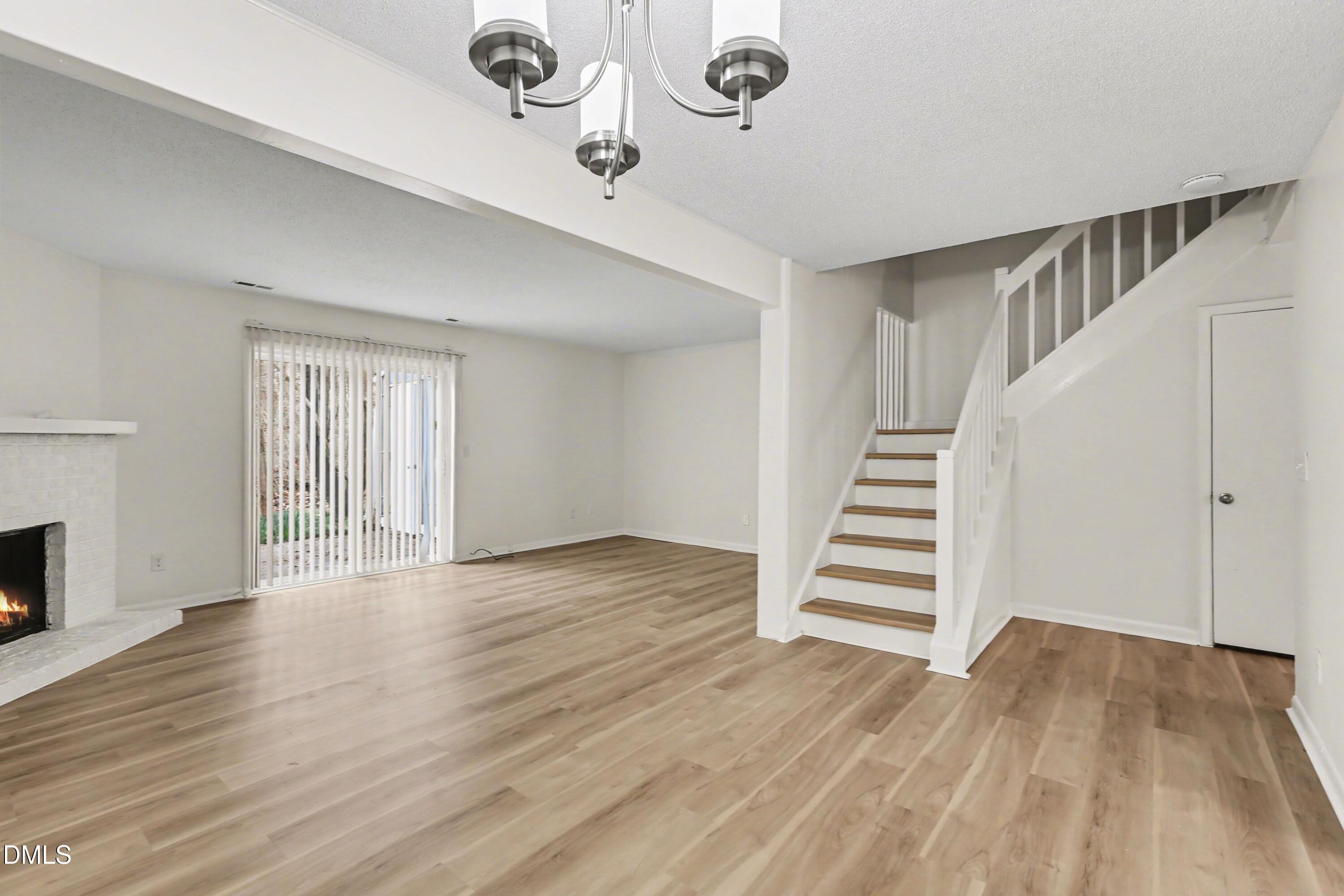 1304 Seaton Road, Unit 30 Durham, NC 27713 - Photo 10 of 25 a view of entryway with wooden floor