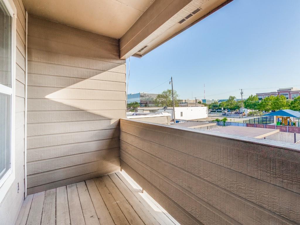 531 Josephine Street Dallas, TX 75246 - Photo 18 of 25 a bathroom with a sink and a mirror