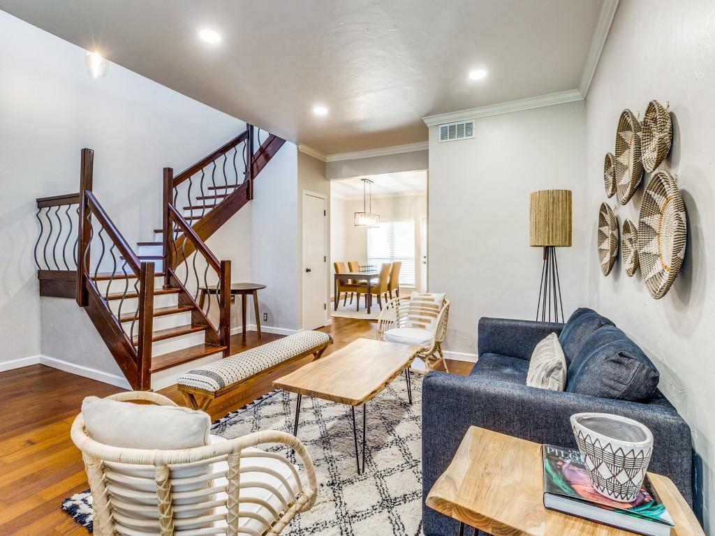 531 Josephine Street Dallas, TX 75246 - Photo 4 of 25 a living room with furniture and a wooden floor
