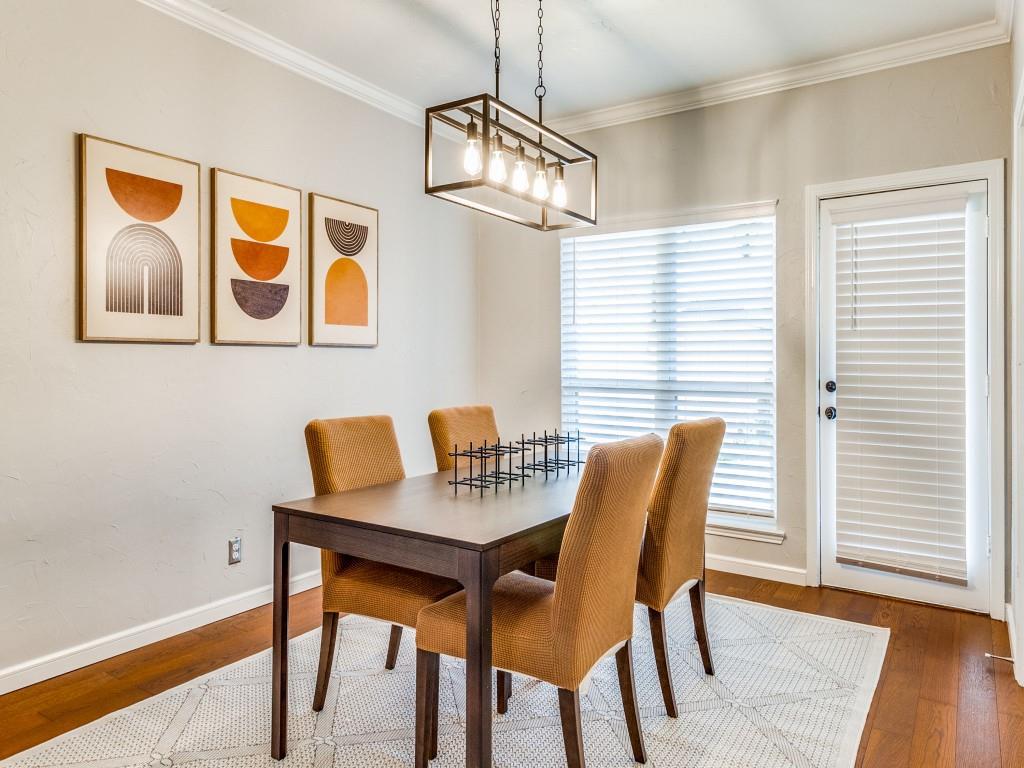531 Josephine Street Dallas, TX 75246 - Photo 8 of 25 a view of a dining room with furniture and wooden floor