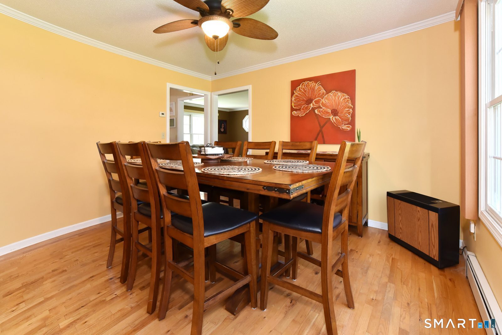 31 North Maple Street East Hampton, CT 06424 - Photo 17 of 38 a view of a dining room with furniture window and wooden floor