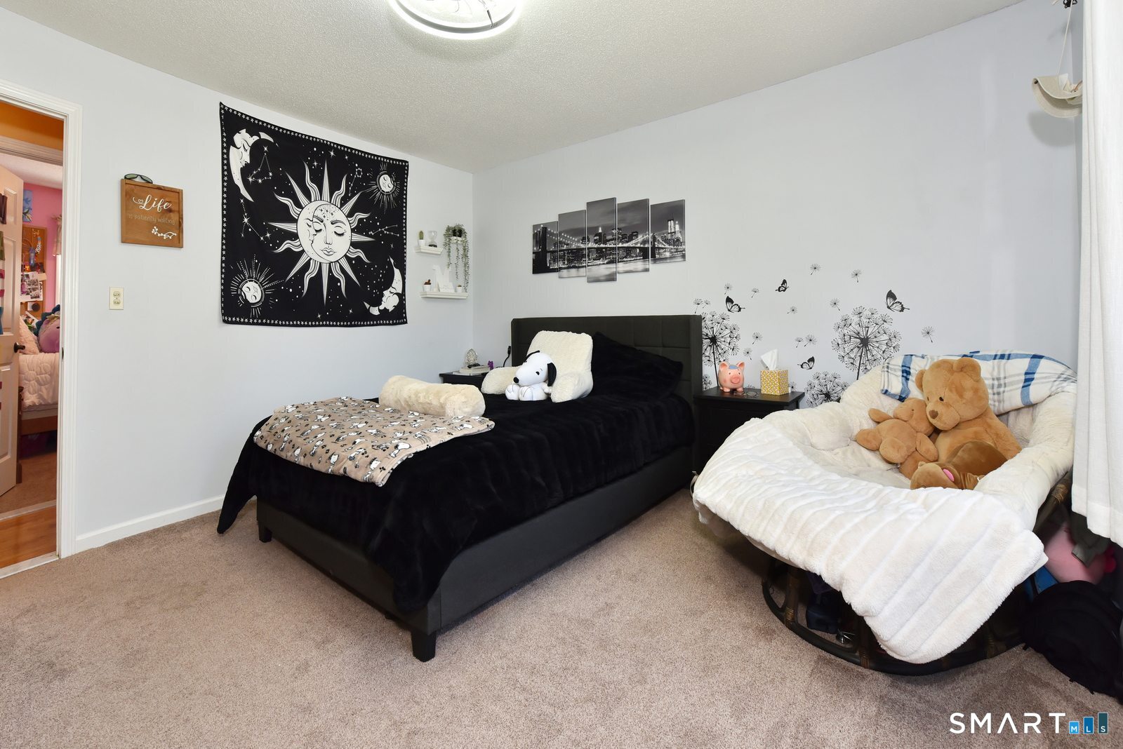31 North Maple Street East Hampton, CT 06424 - Photo 23 of 38 a bedroom with a bed and wall painting