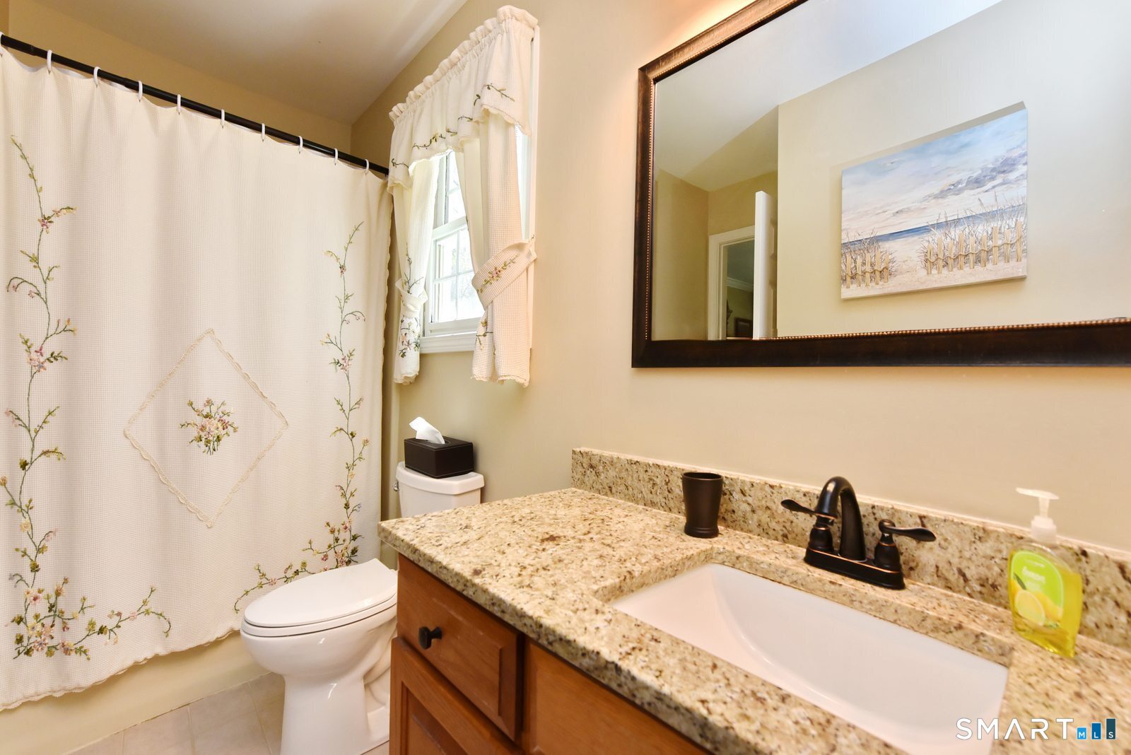 31 North Maple Street East Hampton, CT 06424 - Photo 30 of 38 a bathroom with a granite countertop toilet sink and mirror