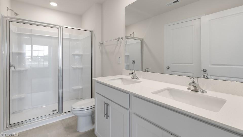 7037 Eclipse Trail Whitsett, NC 27377 - Photo 25 of 25 *photos are of model home and are for representational purposes only.