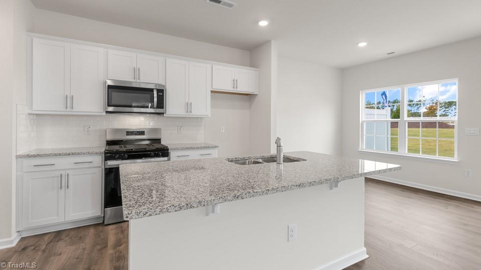 7037 Eclipse Trail Whitsett, NC 27377 - Photo 5 of 25 *photos are of model home and are for representational purposes only.