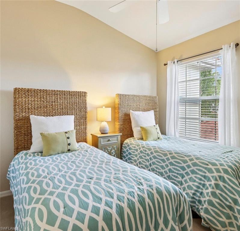 10911 Oak Island Road, Unit 201 Estero, FL 34135 - Photo 16 of 24 a bedroom with double bed and a window