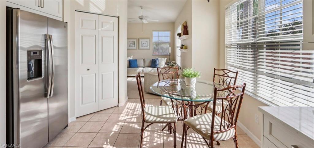 10911 Oak Island Road, Unit 201 Estero, FL 34135 - Photo 9 of 24 a view of a dining room with furniture