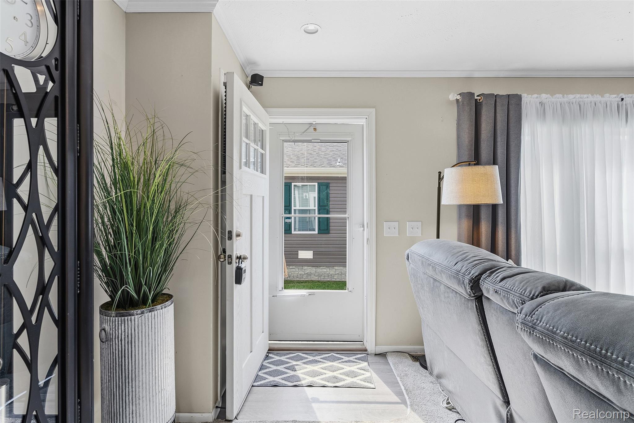 6450 Prince Boulevard Fenton, MI 48430 - Photo 5 of 31 Entryway featuring a Craftsman-style door with glass panels