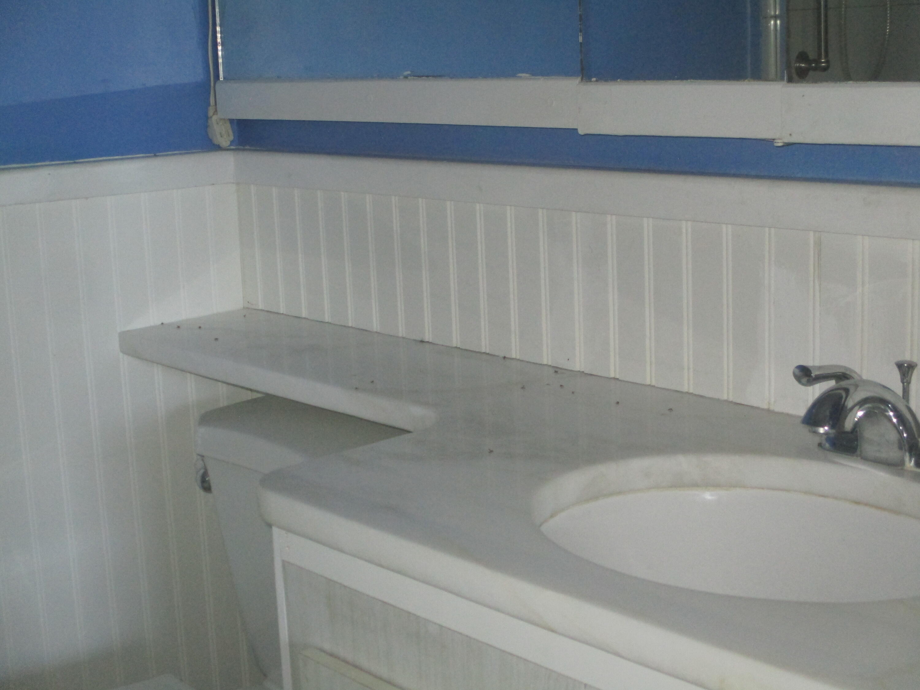 112 Old Wharf Road, Unit E4 Dennis Port, MA 02639 - Photo 12 of 15 a bathroom with a sink and vanity